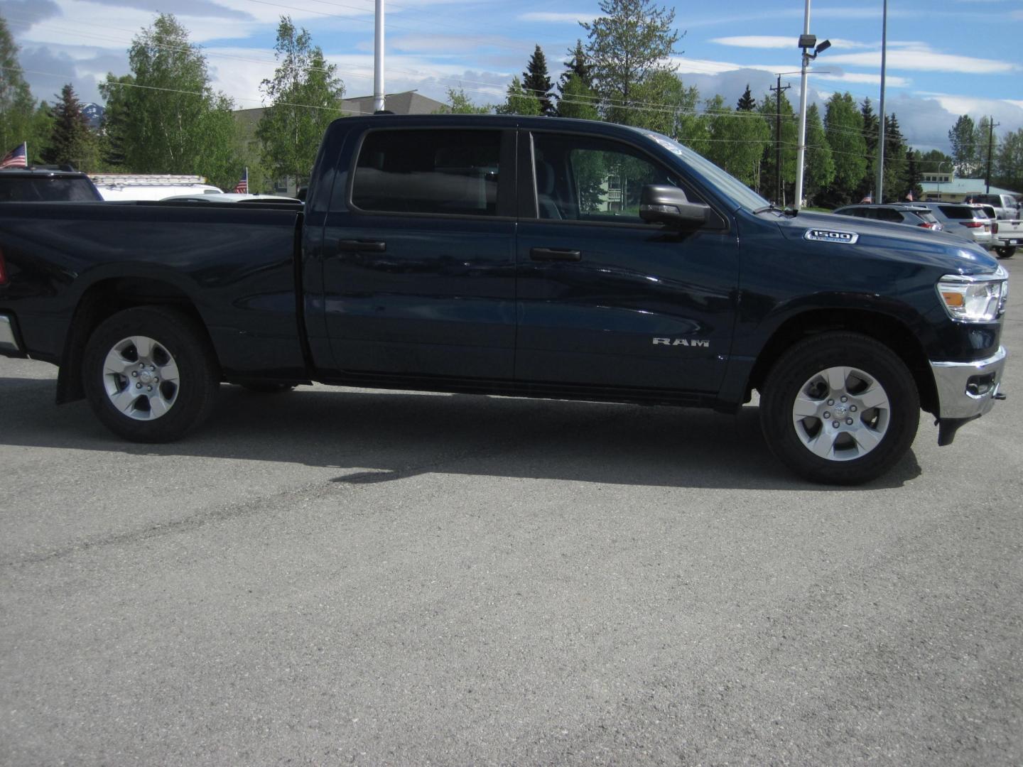 2023 blue /gray RAM 1500 Big Horn Crew Cab 4WD (1C6SRFMTXPN) with an 5.7L V8 OHV 16V engine, 8A transmission, located at 9530 Old Seward Highway, Anchorage, AK, 99515, (907) 349-3343, 61.134140, -149.865570 - Low Miles on this 2023 Ram 1500 Big Horn come take a test drive - Photo#2